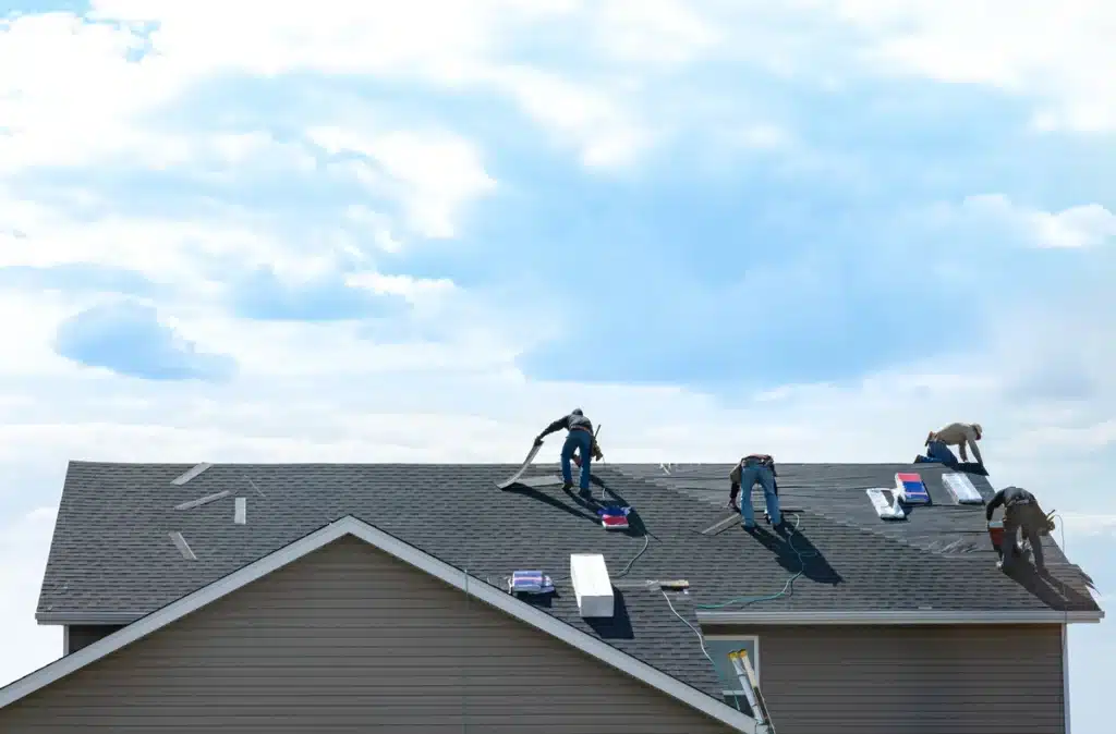 Four Workers Repairing The Roof in Austin, TX