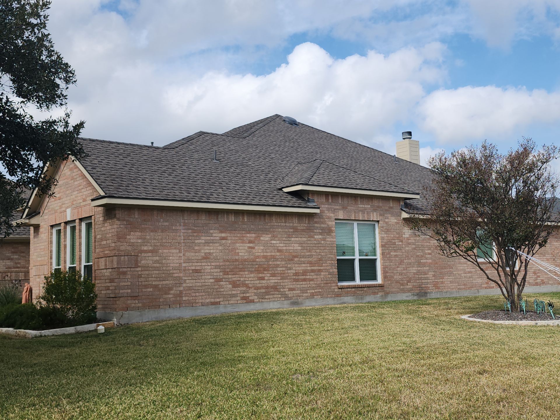 Residential roof completed by Driftwood Builders Roofing