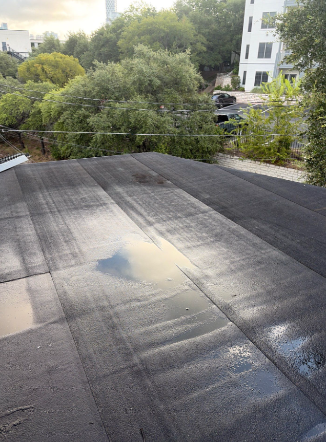 Black Metal & TPO Roof Replacement in South Congress